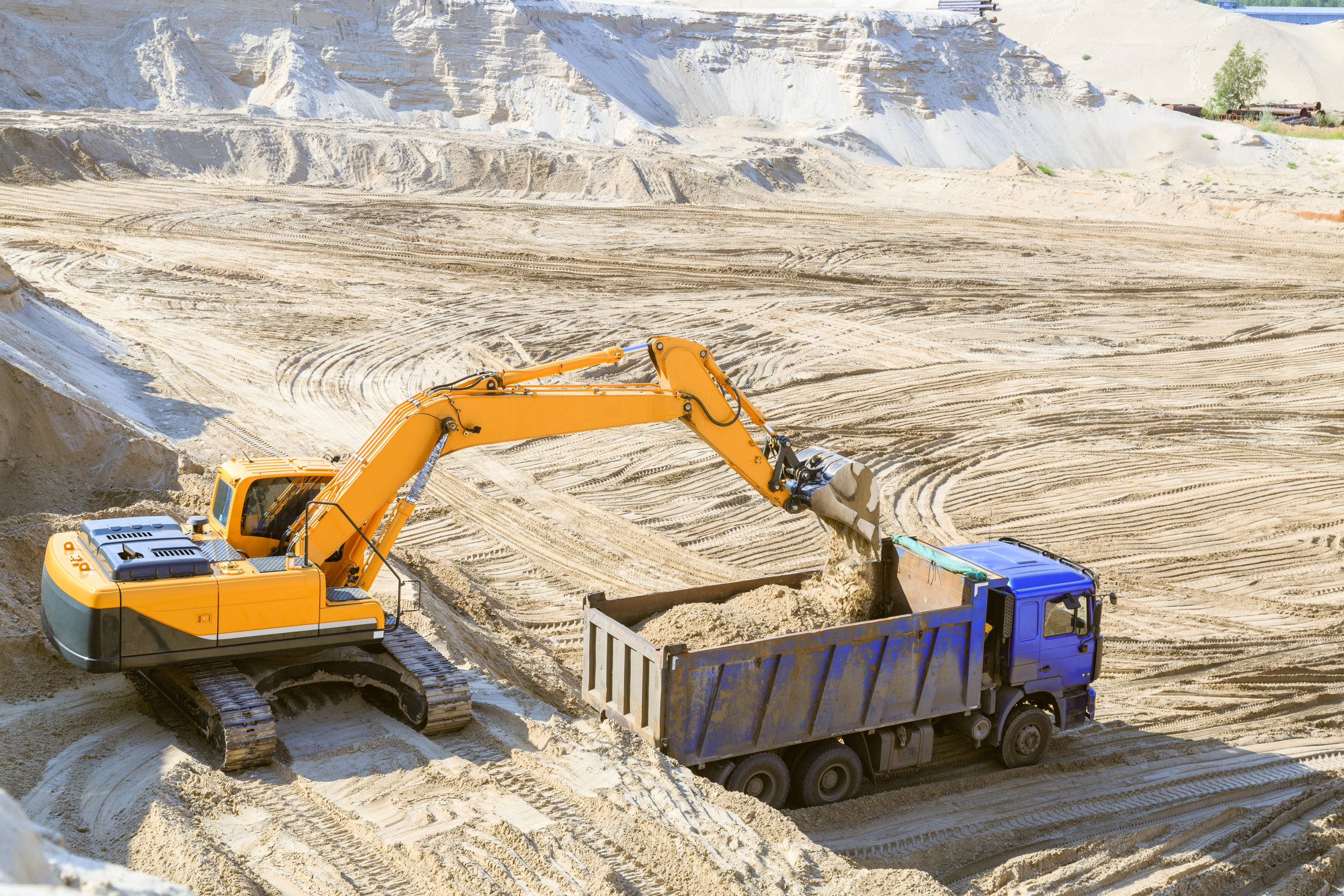 Excavator working on sand quarry